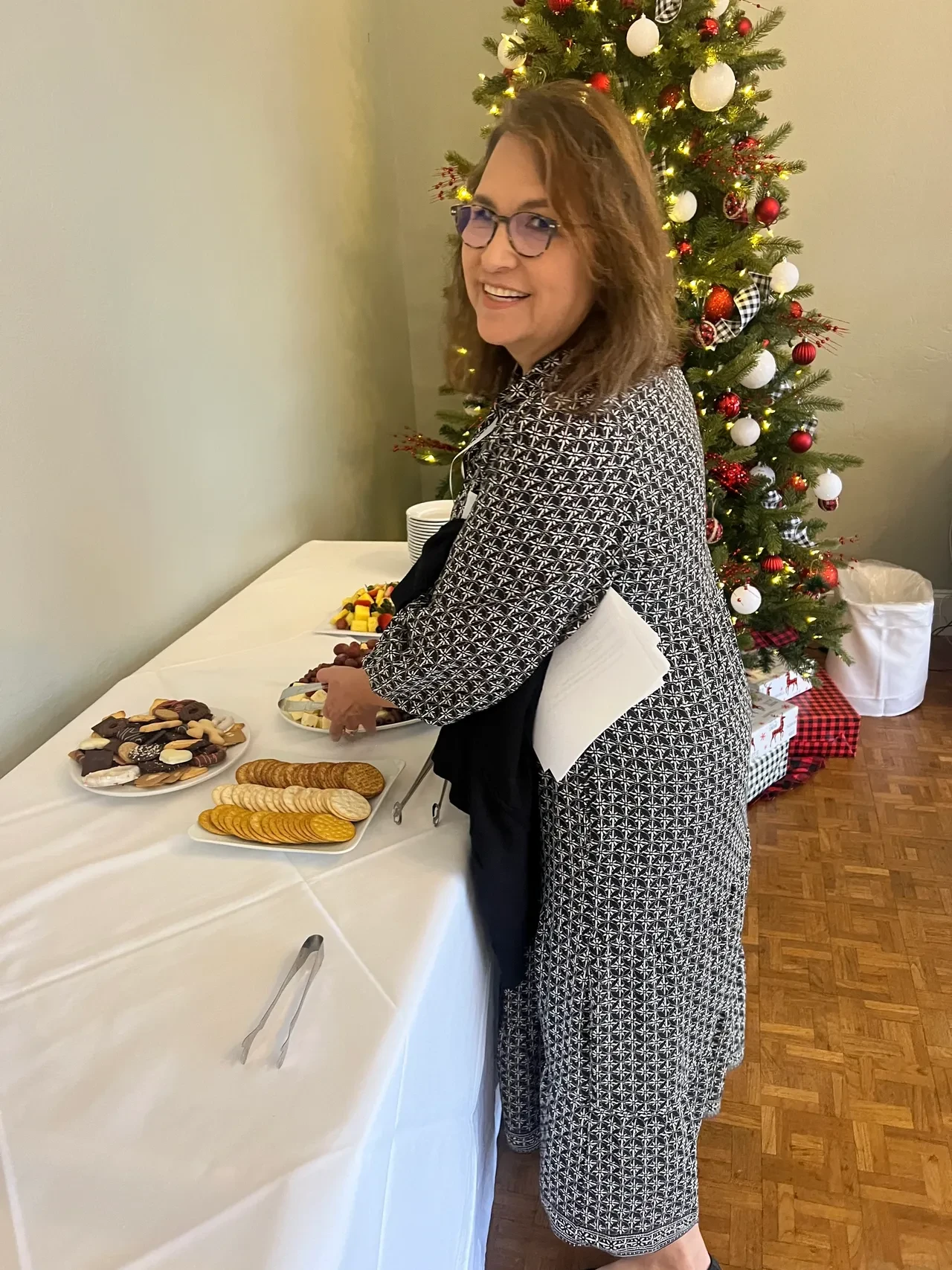 Woman at holiday event food table